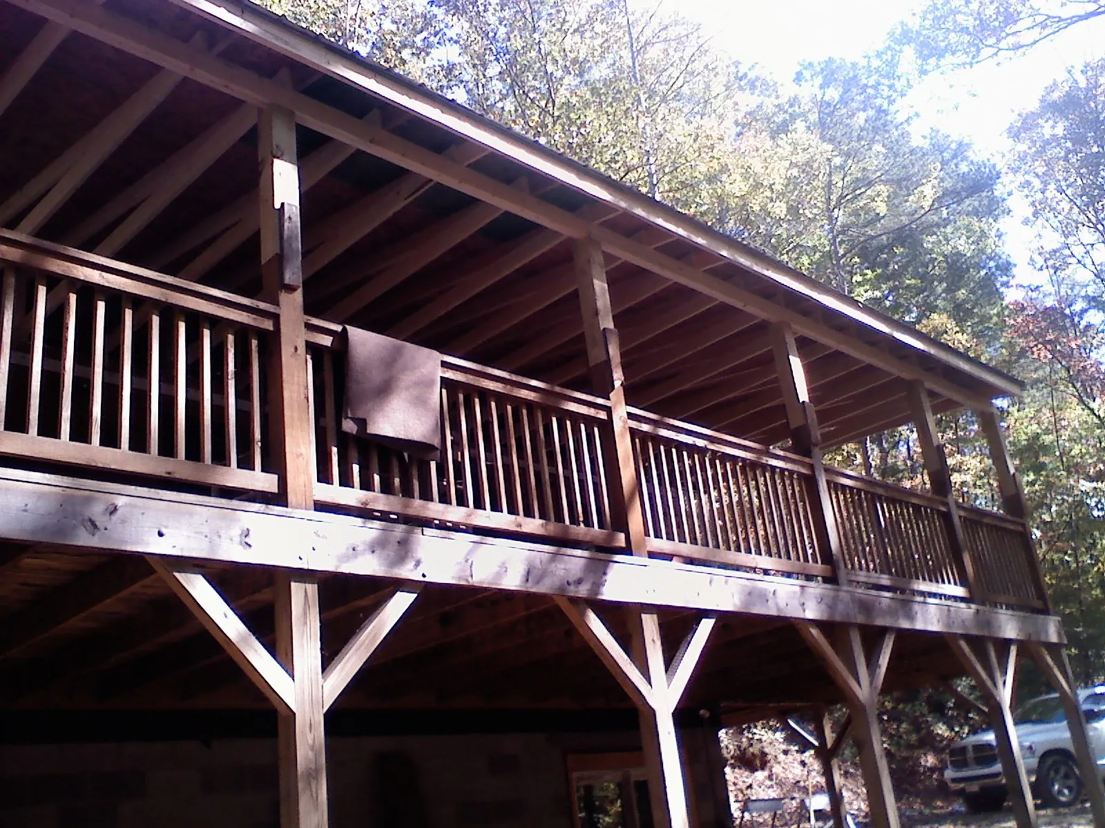 Timber framing under a new elevated porch and deck — Roof Leak Repair in Portsmouth by Roofing Brothers